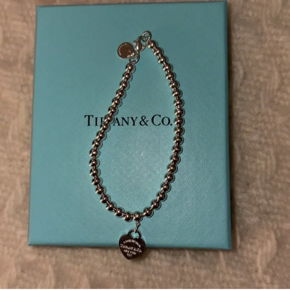 Tiffany & Co. Silver Bracelet with Elegant Design - Picture 2 of 4